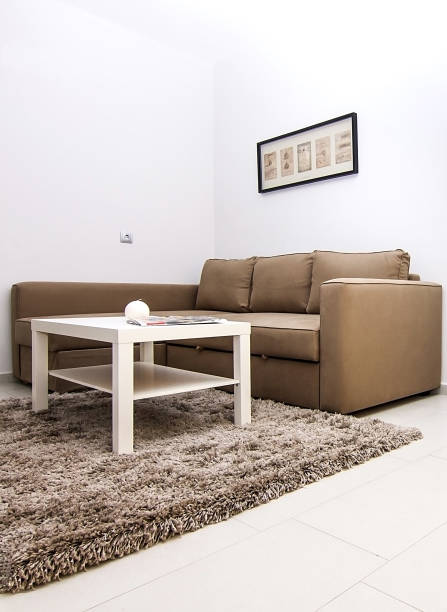 istock Beige sitting group in big living room. 1094976054