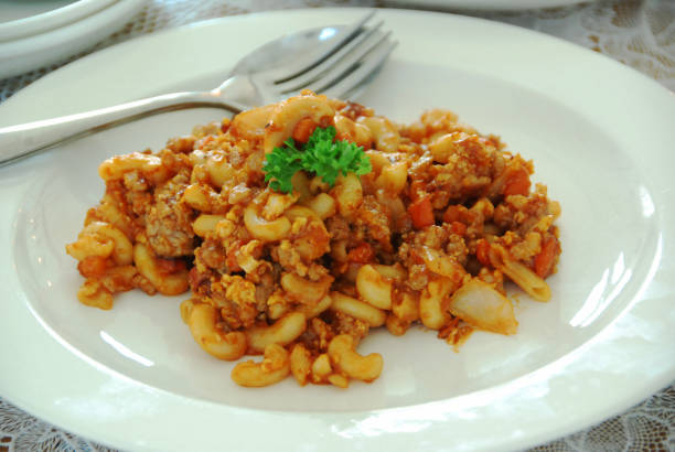 istock fried macaroni with egg, pork and vegetable in tomato sauce in plate 1094978018