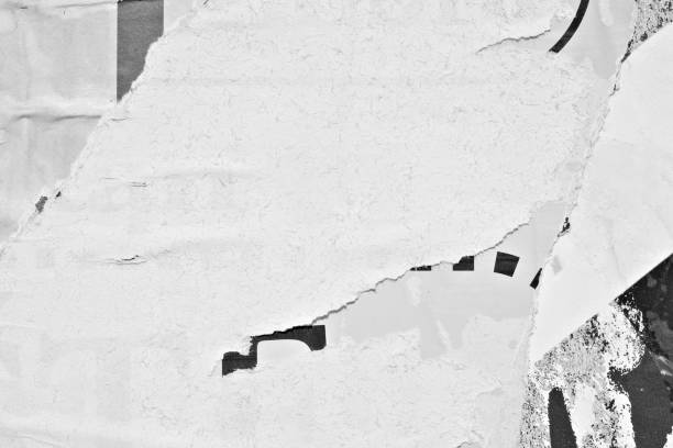 istock Blank white black old ripped torn paper crumpled creased posters grunge textures backdrop backgrounds placard 1094980074