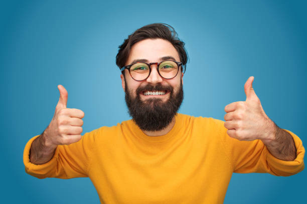 istock Happy hipster gesturing thumbs up 1094980732