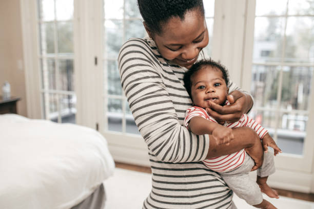 istock mom and newborn baby 1094983648