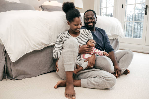 istock Millennial parents and  newborn baby 1094983656