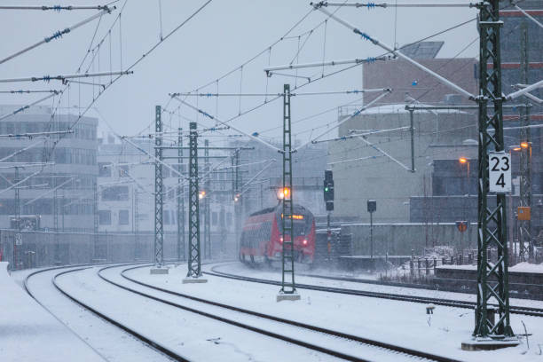 istock Leaving Train in a snowy day 1094985236