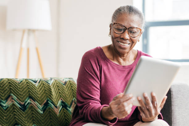 istock Senior women at home using tablet 1094995128