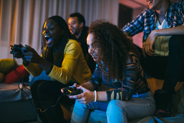 istock Group of friends playing video games 1094995494