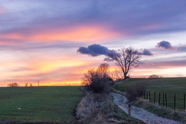 Glorious sunset skies in the fields of Cerdanya in Llivia, Girona, Spain llivia stock pictures, royalty-free photos & images