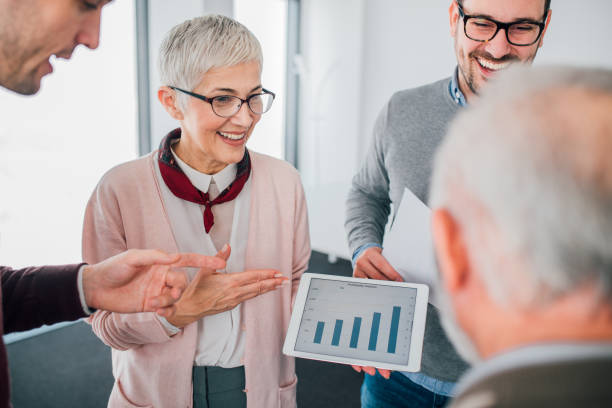 istock Senior business woman with digital tablet 1094999922