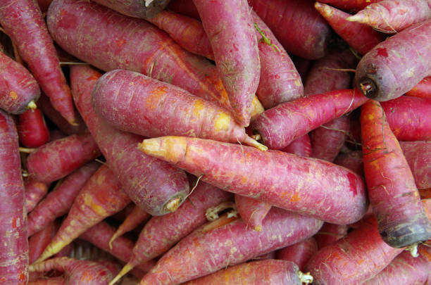 istock Red purplish carrots closeup 1094999930