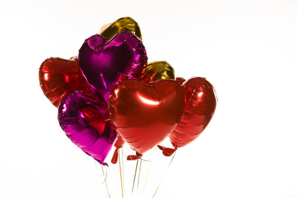 istock Valentine balloons against white background 1095000052