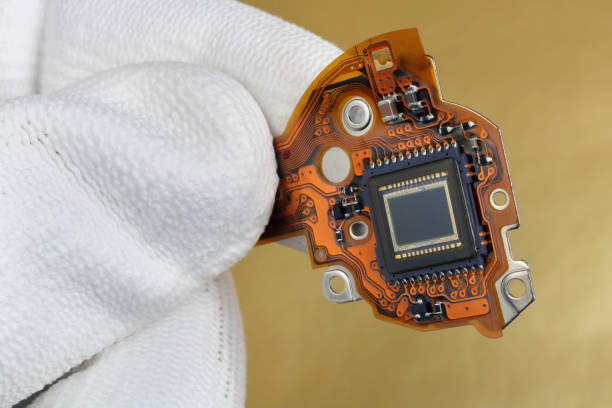 istock A technician controls the quality of a modern sensor for a photo camera 1095000312
