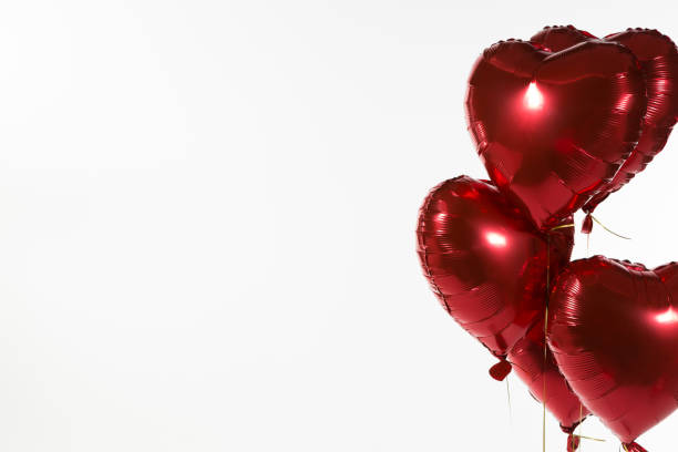 istock Valentine balloons against white background 1095000724
