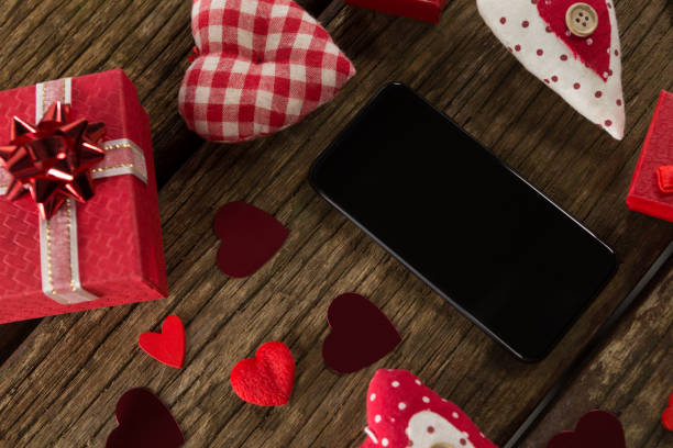 istock Heart shape decorations, gifts and mobile phone 1095005860