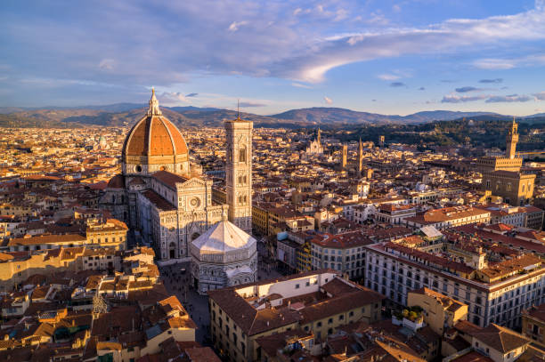 Florence - Aerial of Santa Maria del Fiore Cathedral Aerial View of Duomo of Santa Maria del Fiore at Sunset - Firenze - Italy florence italy stock pictures, royalty-free photos & images