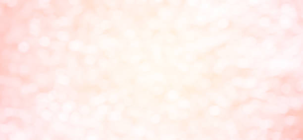 abstract blur beautiful pink or rose gold color panoramic background with bokeh light party for merry christmas, happy new year celebrate and valentines day 14 february festive concept