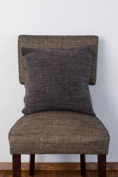 istock Cushion arranged on chair 1095023958