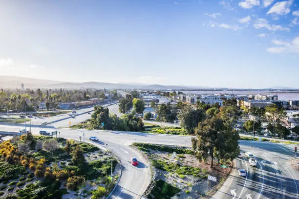 Cars driving on the highway on the shoreline of San Francisco bay, Redwood City, California