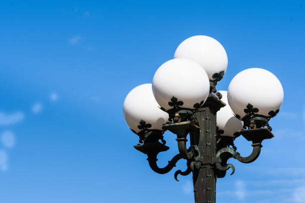 istock Vintage street lights on a blue sky background 1095031896