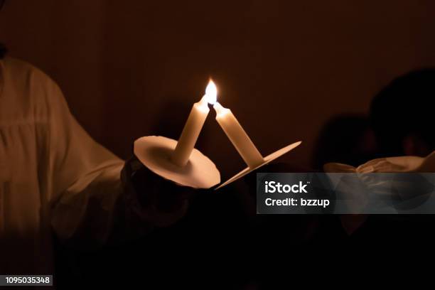 People Handling Candles In The Hands Christmas And Lucia Holidays In Sweden Stock Photo - Download Image Now