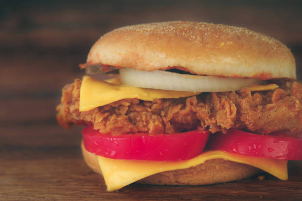 istock Homemade hamburger or sandwich on brown paper. 1095037732