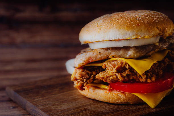 istock Homemade hamburger or sandwich on brown paper. 1095037894