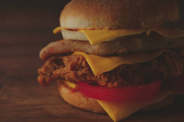 istock Homemade hamburger or sandwich on brown paper. 1095038032