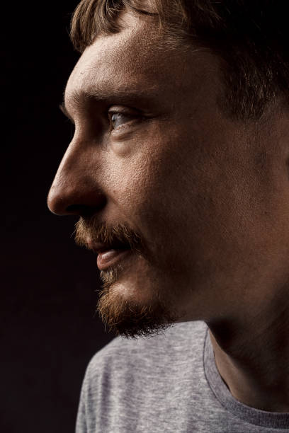 istock Creative male portrait. Handsome young man looking to the side, profile view 1095040128