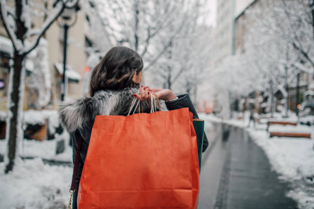 istock Woman with shopping bags 1095044520
