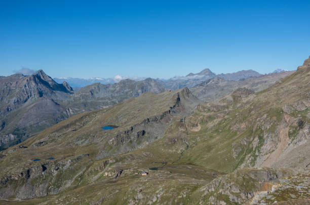 Mountain panorama of Aosta Valley from Monte Rosa massif near Punta Indren. Alagna Valsesia area, Italy Mountain panorama of Aosta Valley from Monte Rosa massif near Punta Indren. Alagna Valsesia area, Italy alagna stock pictures, royalty-free photos & images