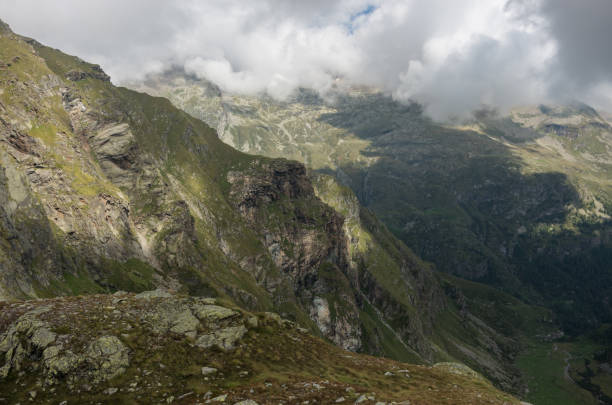 View to valley Bors from top of Cascata delle Pisse waterfall, Alagna Valsesia area, Italy View to valley Bors from top of Cascata delle Pisse waterfall, Alagna Valsesia area, Italy alagna stock pictures, royalty-free photos & images