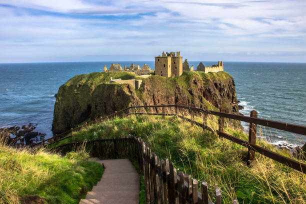 Stonehaven, Aberdeenshire, Scotland, UK - May 10, 2014: Dunnottar Castle - a ruined medieval fortress located upon a rocky headland on the coast of Scotland near Aberdeen. stock photo