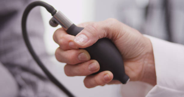 istock Close-up of doctor's hand pumping pulsometer 1095060572