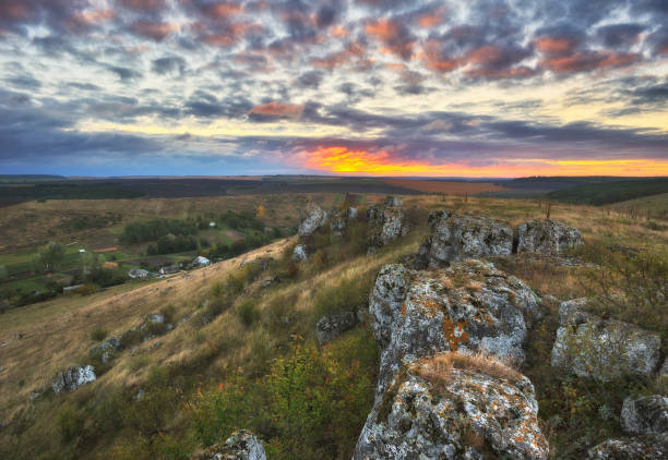 istock dramatic autumn dawn. picturesque rocks. morning silence 1095061902