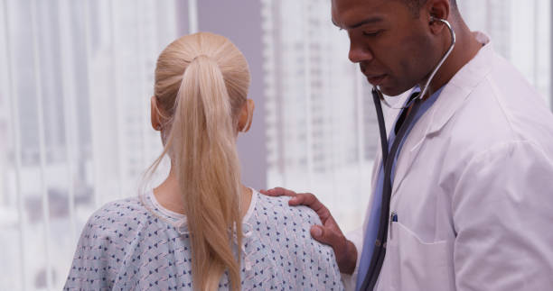 istock Black doctor talking to patient 1095062144