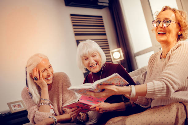 istock Joyful delighted woman spending time with her friends 1095066458