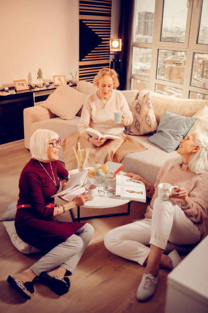 istock Nice happy women sharing their impressions about books 1095066534