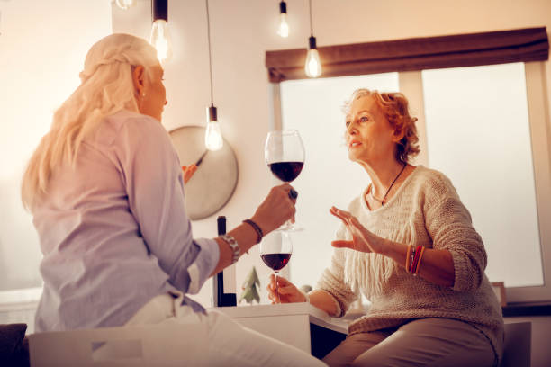 istock Positive aged women chatting with each other 1095066612