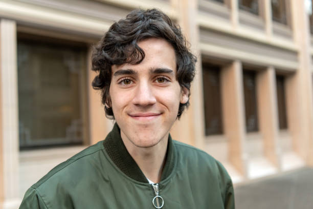 Smiling young man looking at the camera