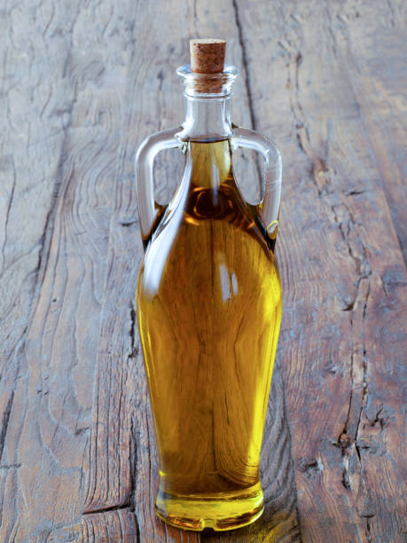 istock olive oil product over wooden table 1095077470