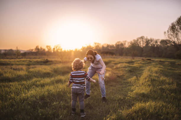 istock Mother and son having fun outdoors 1095077910