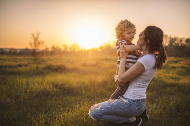 istock Mother and son in nature 1095078192