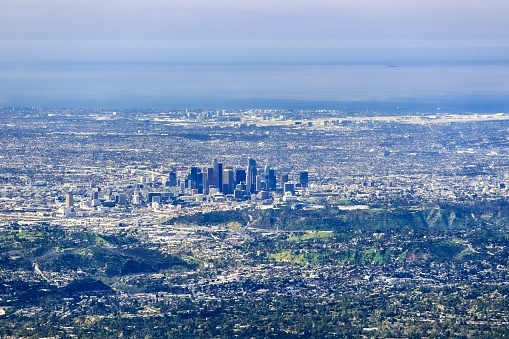 Aerial view of the downtown Los Angeles; LA airport and the Pacific Ocean coastline in the background; south California