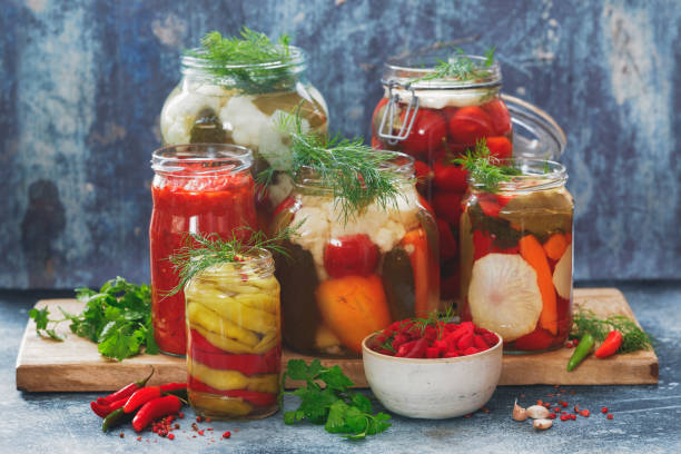 istock Colorful preserved and marinated seasonal vegetables with herbs 1095079904