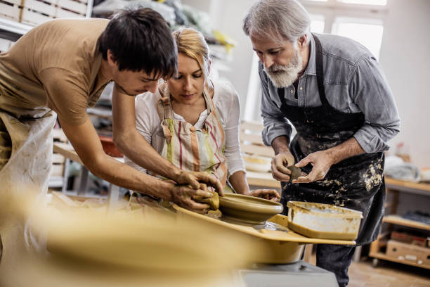 Small Group of People Creating Pottery