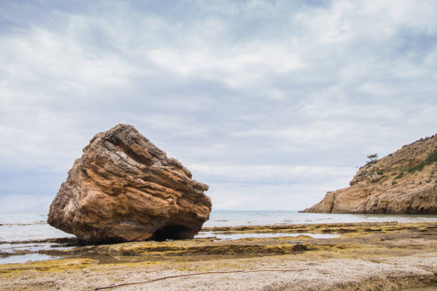 istock Boulder rock by the sea 1095084146
