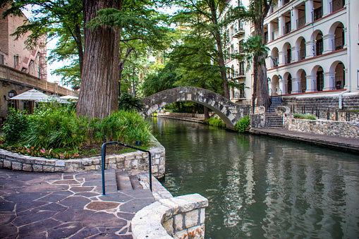 Stone walkways on the San Antonio Riverwalk  take you to restaurants and hotels.