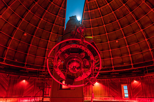 The historical 36-inch Shane telescope at Lick Observatory ready for night sky viewing; red lights switched on; Mount Hamilton; San Jose, south San Francisco bay