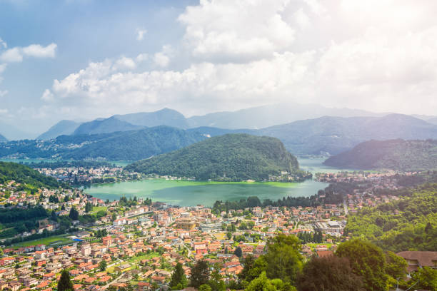 Panoramic view over Ponte Tresa with Lake Lugano Ponte Tresa is located on the border between Switzerland and Italy on Lake Lugano. It is a well-known tourist destination during the summer holidays. lugano stock pictures, royalty-free photos & images
