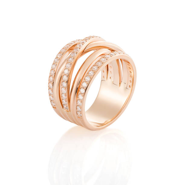 istock Pink gold ring with diamonds isolated on white background 1095099052