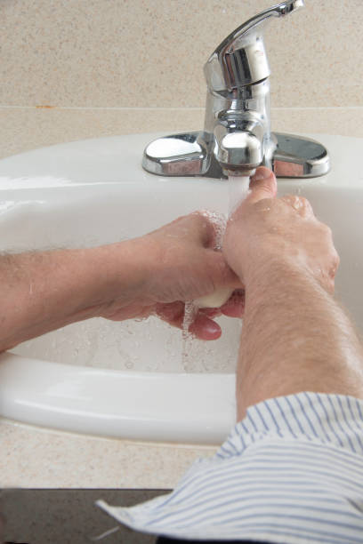 istock Washing hands with soap and water 1095100224