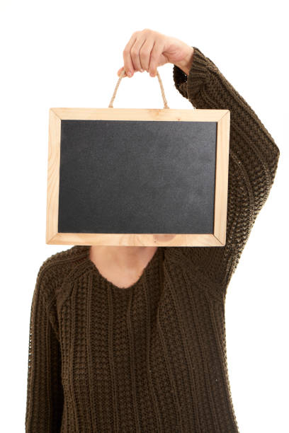 istock Woman Holding Blank Blackboard 1095103466